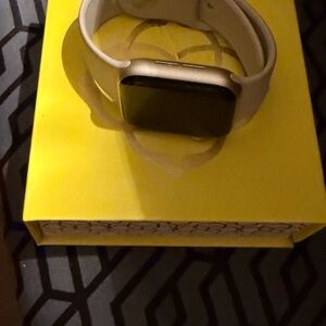 Apple Silver Smartwatch with Light Gray Silicone Band